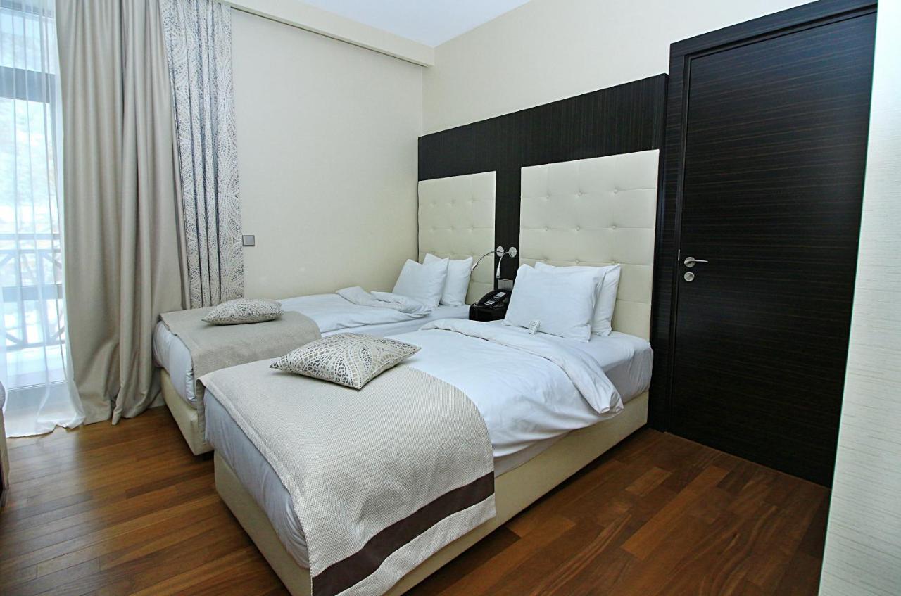 Crowne Plaza - Borjomi By Ihg Hotel Buitenkant foto A bedroom in a hotel